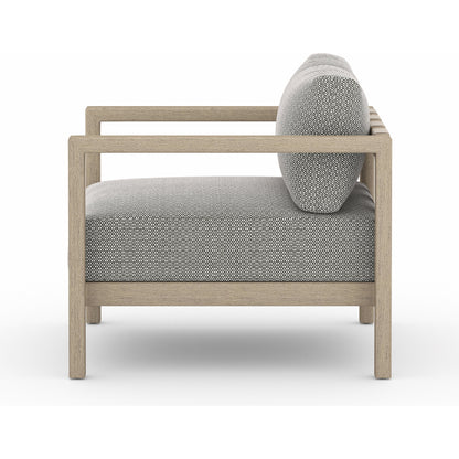 Sonoma Outdoor Chair by Four Hands. Made from 100% olefin, aluminum, 100% polypropylene in a coastal style.