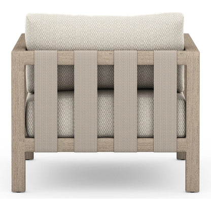 Sonoma Outdoor Chair by Four Hands. Made from 100% olefin, aluminum, 100% polypropylene in a coastal style.