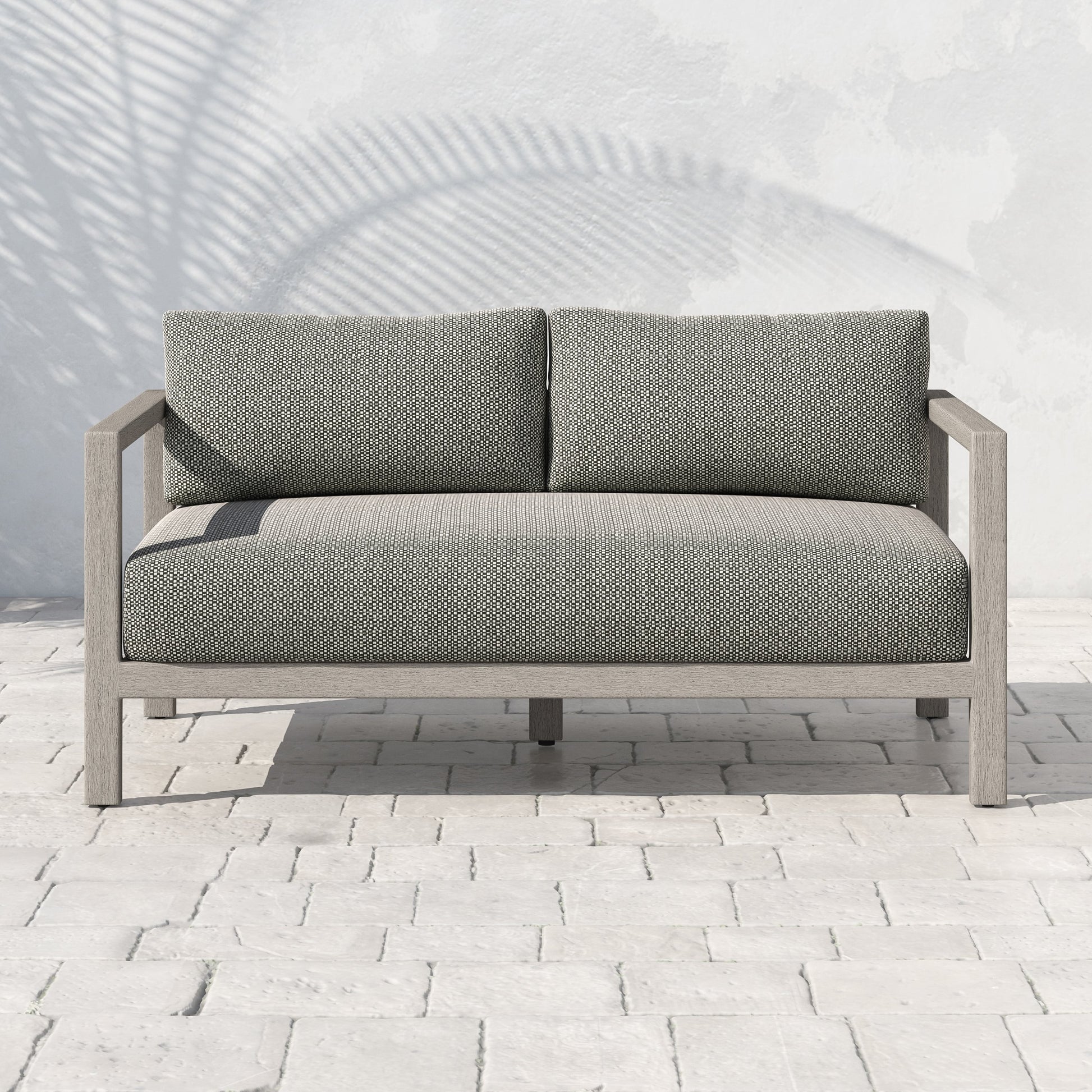 Sonoma Outdoor Sofa by Four Hands. Made from unique in a coastal style.