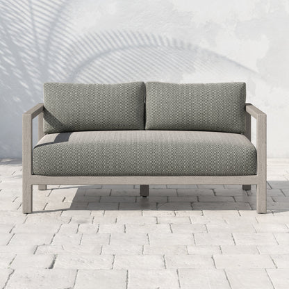 Sonoma Outdoor Sofa by Four Hands. Made from unique in a coastal style.