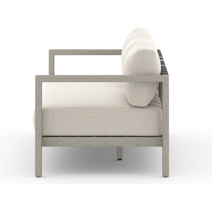 Sonoma Outdoor Sofa by Four Hands. Made from unique in a coastal style.