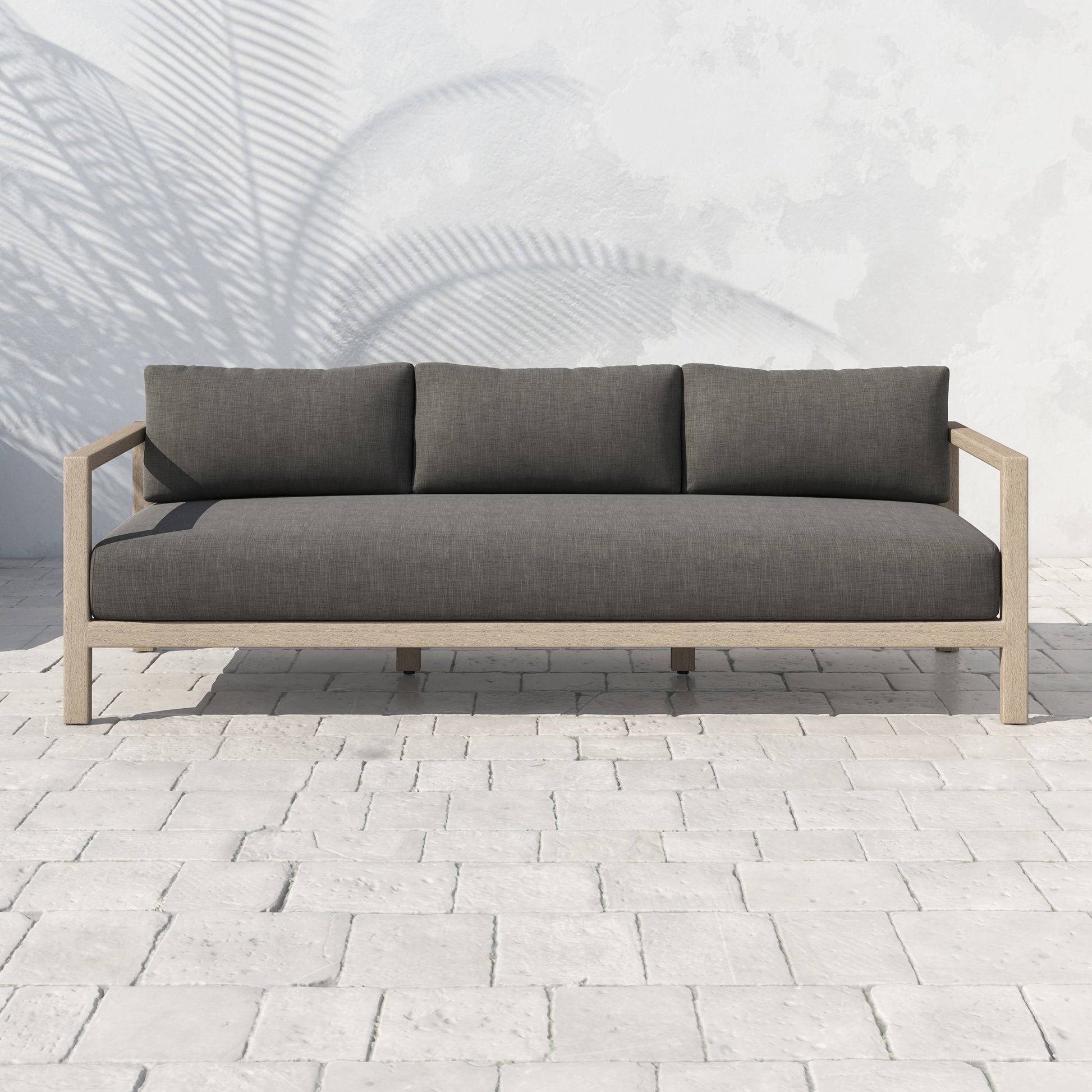 Sonoma Outdoor Sofa by Four Hands. Made from unique in a coastal style.