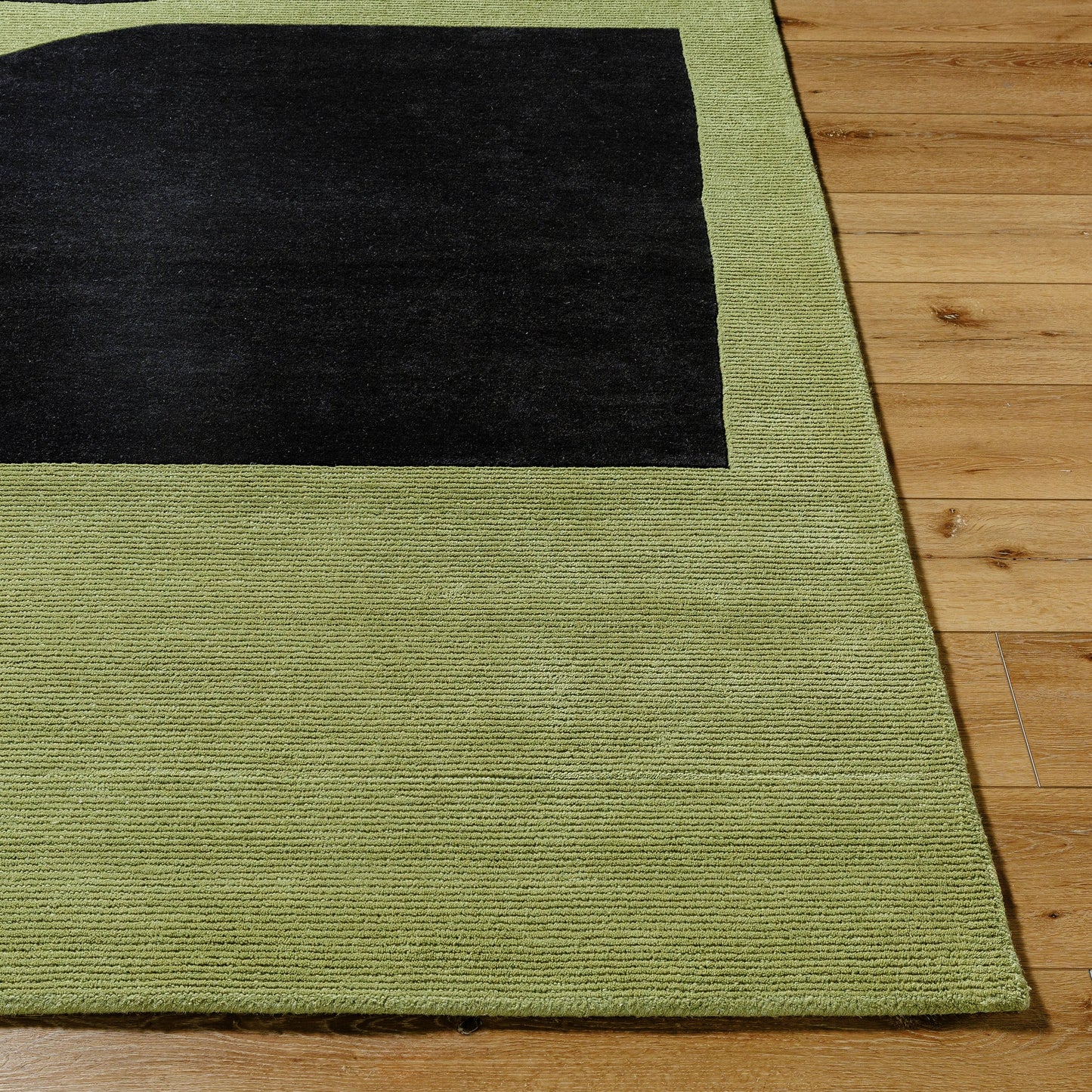 003 SI-2165939,SI-2165940,SI-2165941,SI-2165942 | Closeup | Jason Wu Rug - 5740 by Surya in prairie dust, jet black, black. Made from wool in a unique style.
