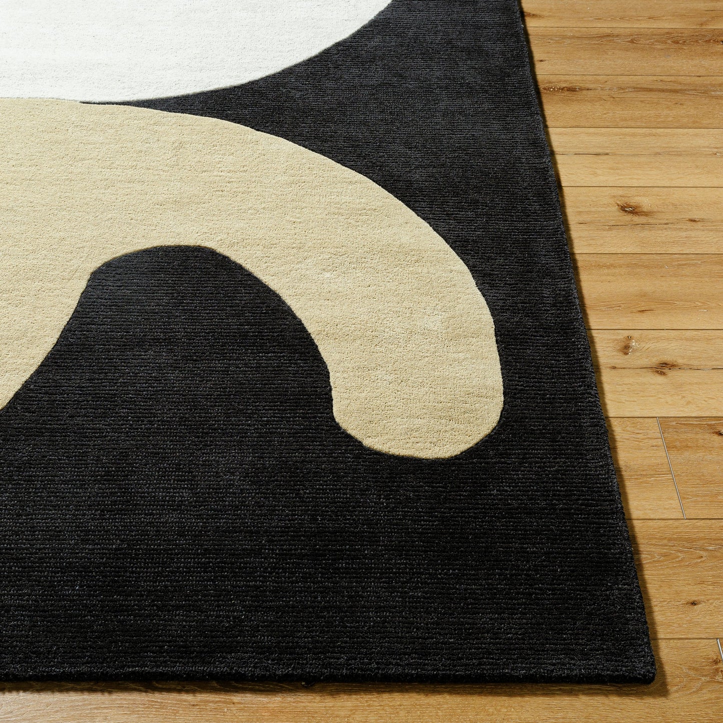 004 SI-2163181,SI-2163182,SI-2163183,SI-2163184 | Closeup | Jason Wu Rug - 36255 by Surya in black, natural, camel. Made from wool in a unique style.