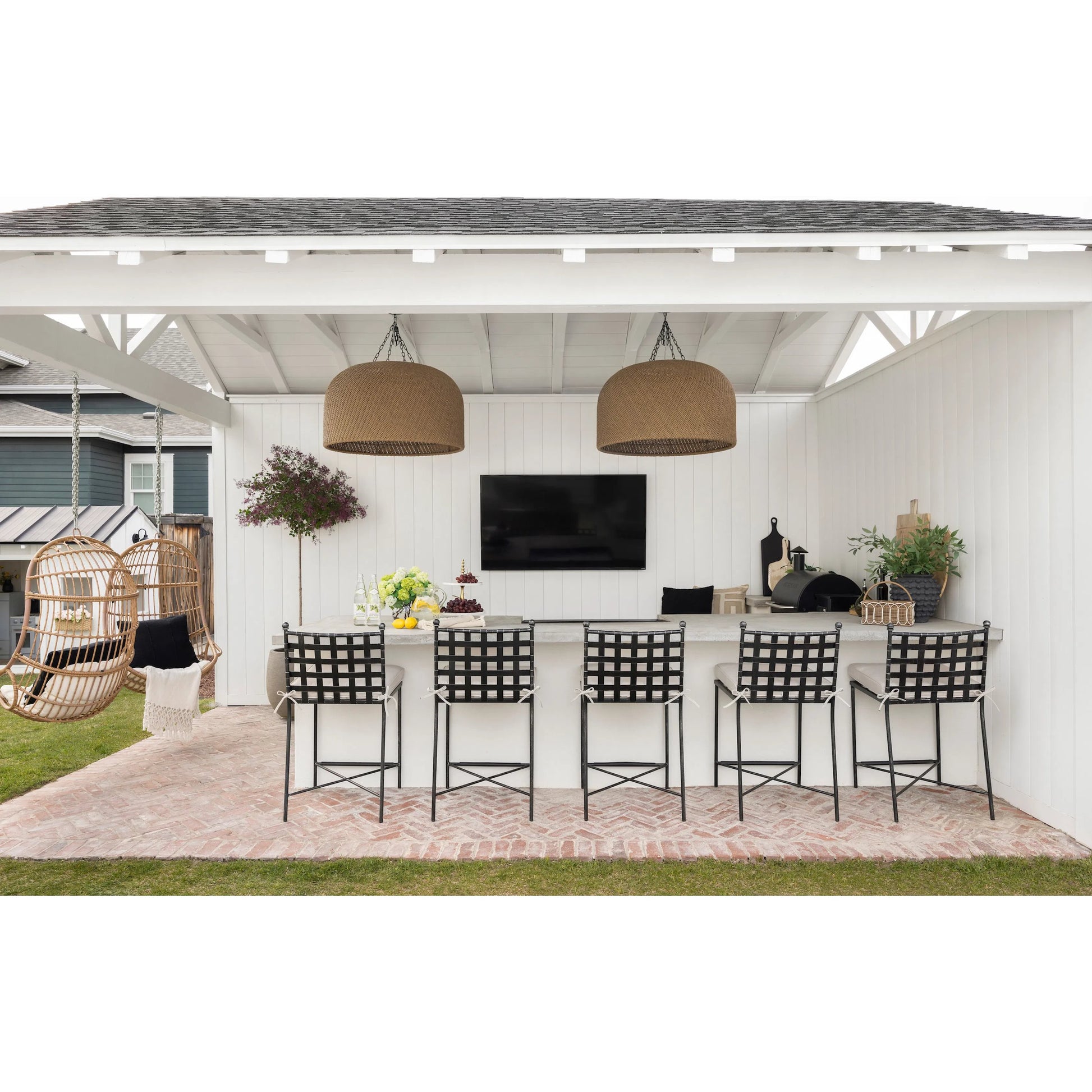 Provence Outdoor Barstool by Sunset West. Made from wrought iron in a modern style.