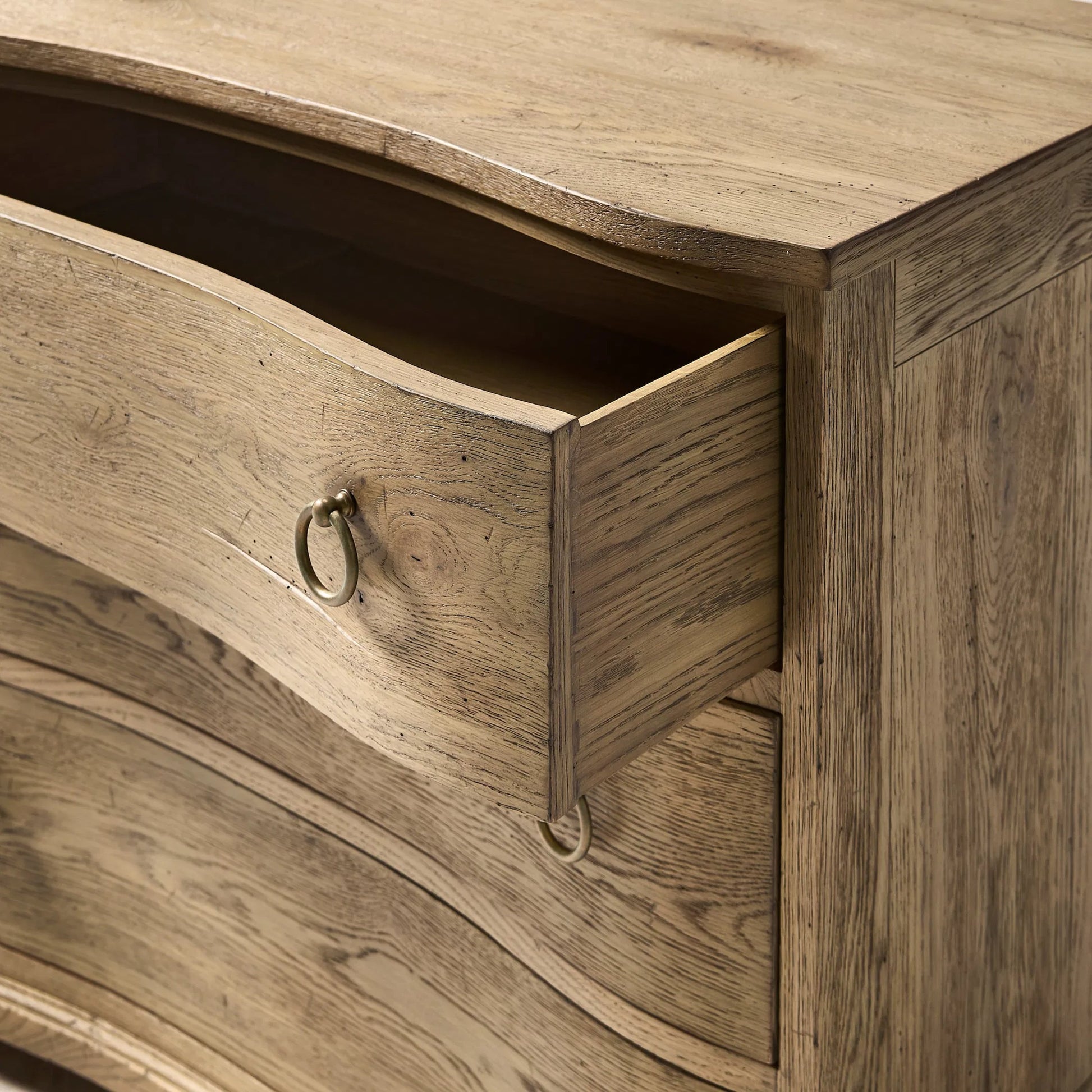 Echo Canyon Three Drawer Nightstand by Jonathan Charles in faded oak. Made from main oak in a unique style.