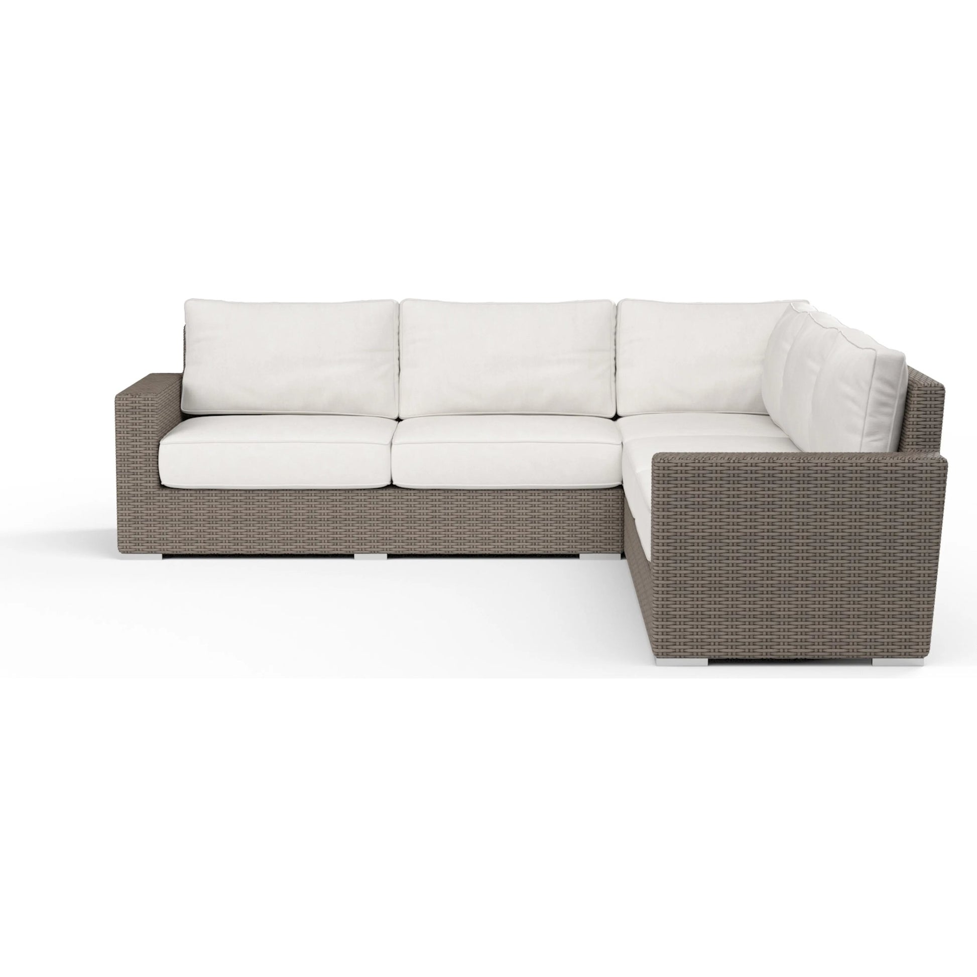 Coronado Outdoor Sectional in Canvas by Sunset West in driftwood. Made from resin wicker in a modern style.
