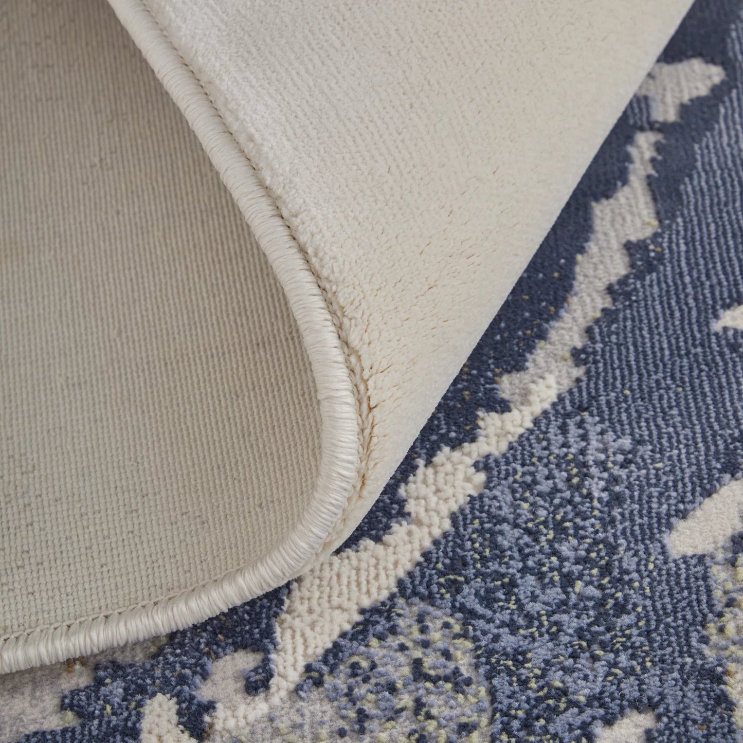 006 SI-2518385,SI-2518386 | Closeup | Mandana CME39M0F Rug by Feizy in ivory, blue. Made from polyester, polypropylene in a unique style.