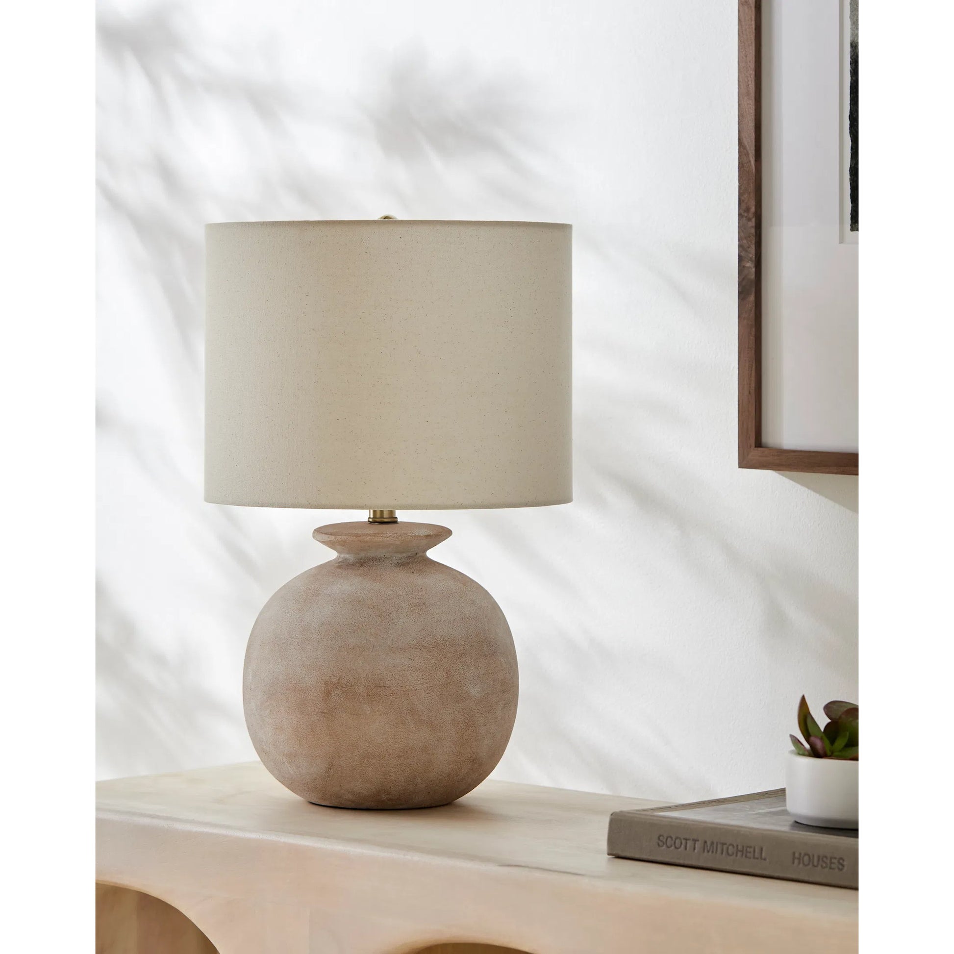 Kaia Accent Table Lamp 531694 by Livabliss in body: cream; shade: beige; finial: metallic - brass; harp: metallic - brass; cord: translucent and coloredplated. Made from resin, linen, polyester, iron in a transitional style.