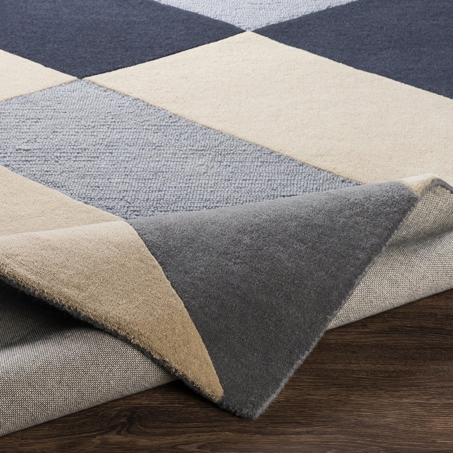 006 SR-827060,SR-827061,SR-827065 | Closeup | Kennedy Rug - 27063 by Surya in ink blue, medium gray, light beige, charcoal, denim. Made from 100% wool in a unique style.