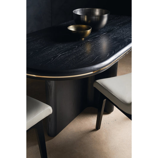 Monty Dining Table by Caracole in basalt, polished french gold. Made from ash, oak in a modern style.