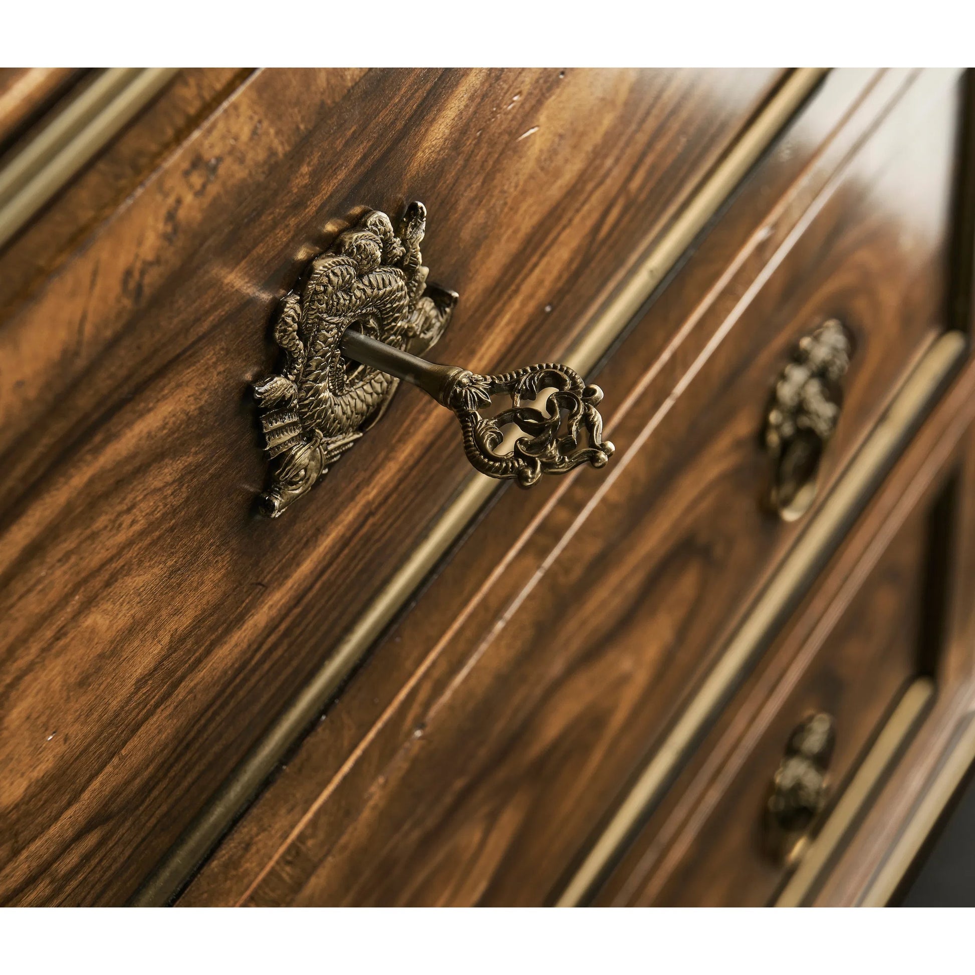 Viceroy Dresser by Jonathan Charles in brown and santos brown, antique brass. Made from mahogany, cerejeira veneers, santos rosewood crown veneers, brass in a traditional style.