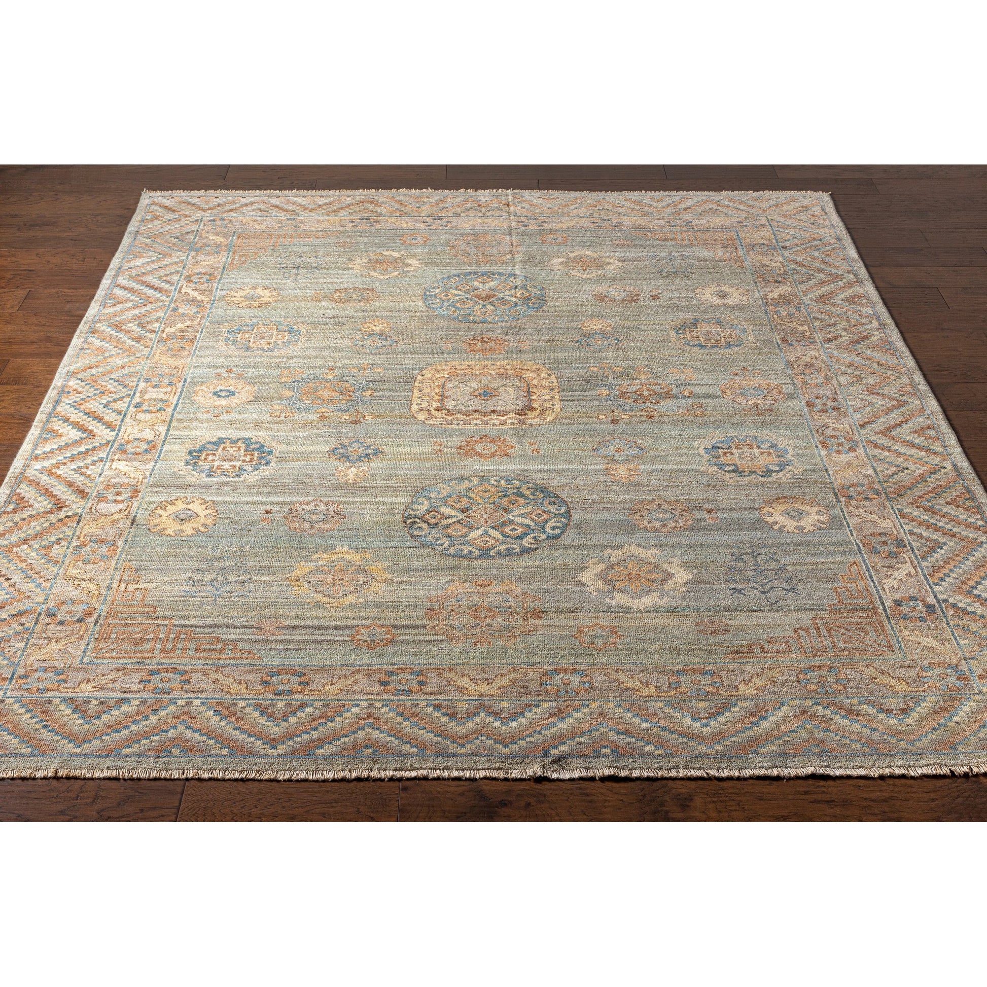 Khotan KHT-2302 Rug by Surya in sage, blue, mauve, light beige, cream, camel. Made from 100% wool in a unique style.
