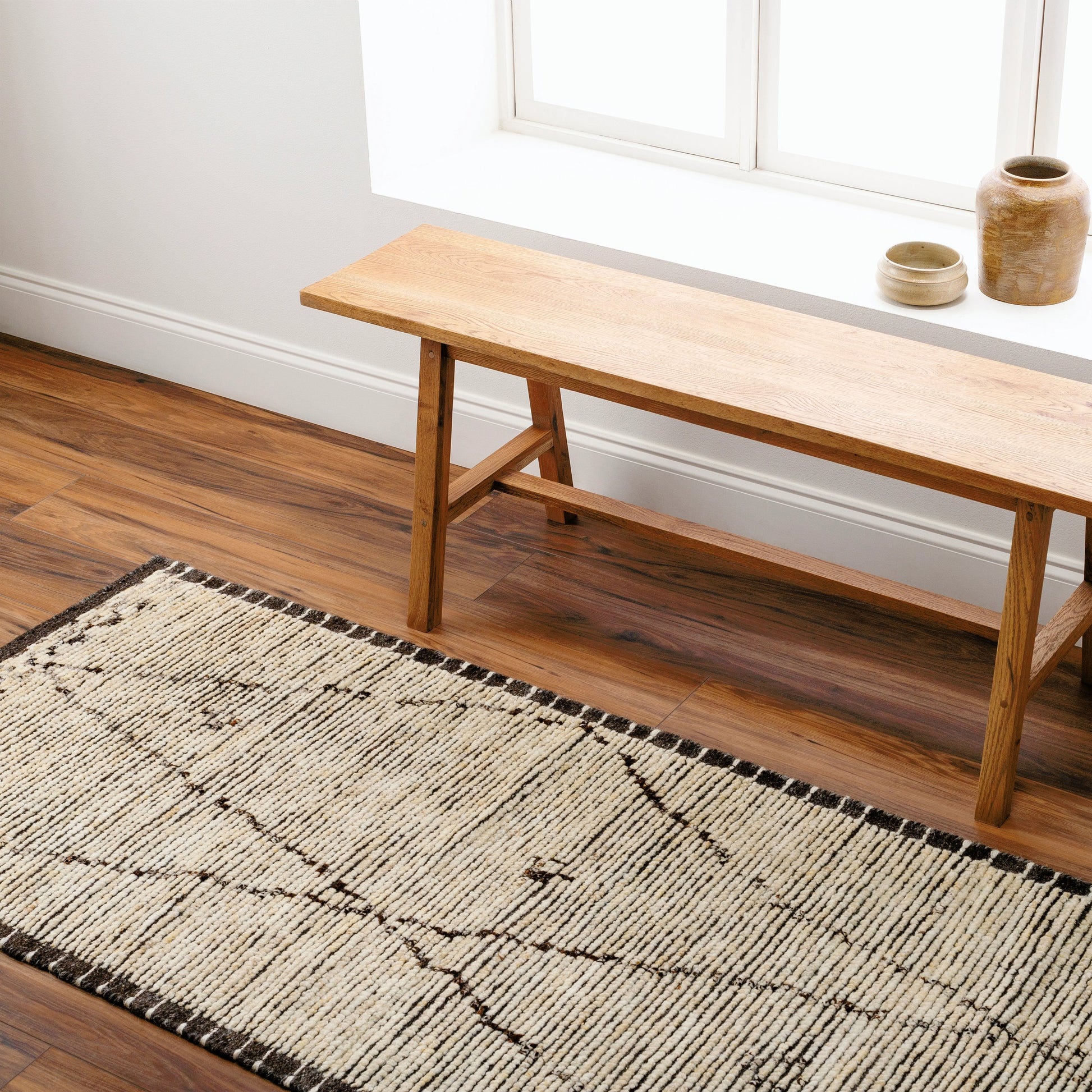 Khyber Rug - 30236 by Surya in black, charcoal, dark brown, beige, wheat. Made from 90% wool, 10% polyester in a unique style.