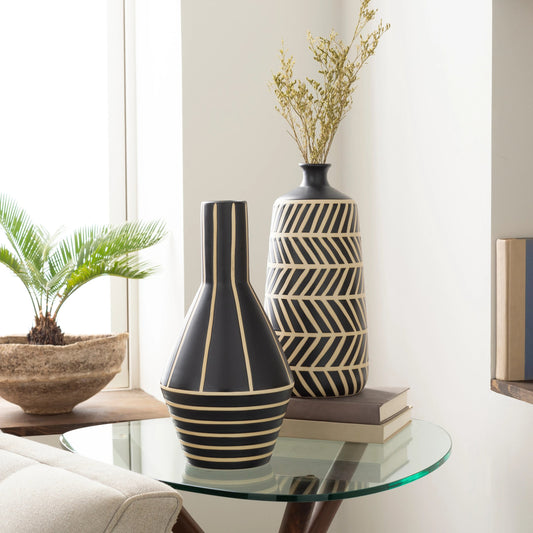 Kisii - 24678 by Livabliss in black and glazed. Made from ceramic in a eclectic & global style.