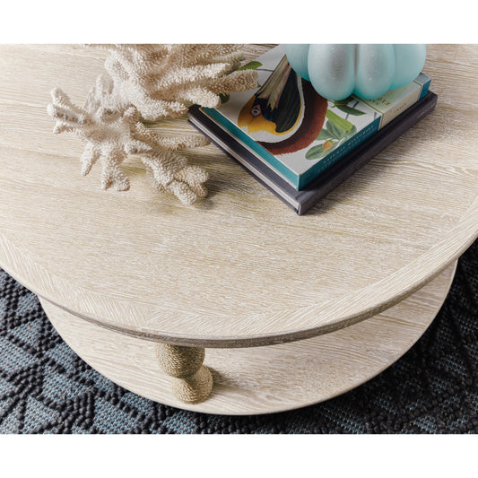 Serenity Bahari Round Cocktail Table by Hooker Furniture in surf. Made from oak veneers, rope in a cottage & farmhouse style.