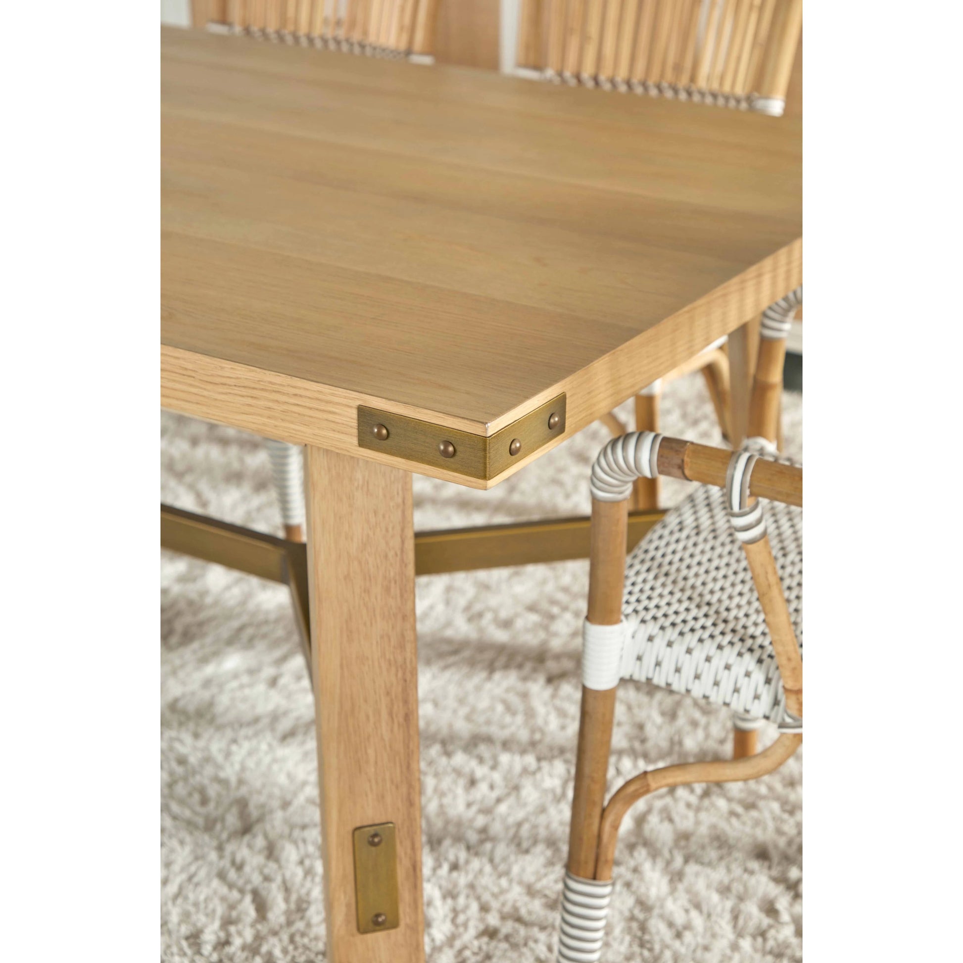 Klein Dining Table by Essentials For Living in light honey oak, brushed gold. Made from oak veneer, mdf, solid rubberwood, metal in a modern style.
