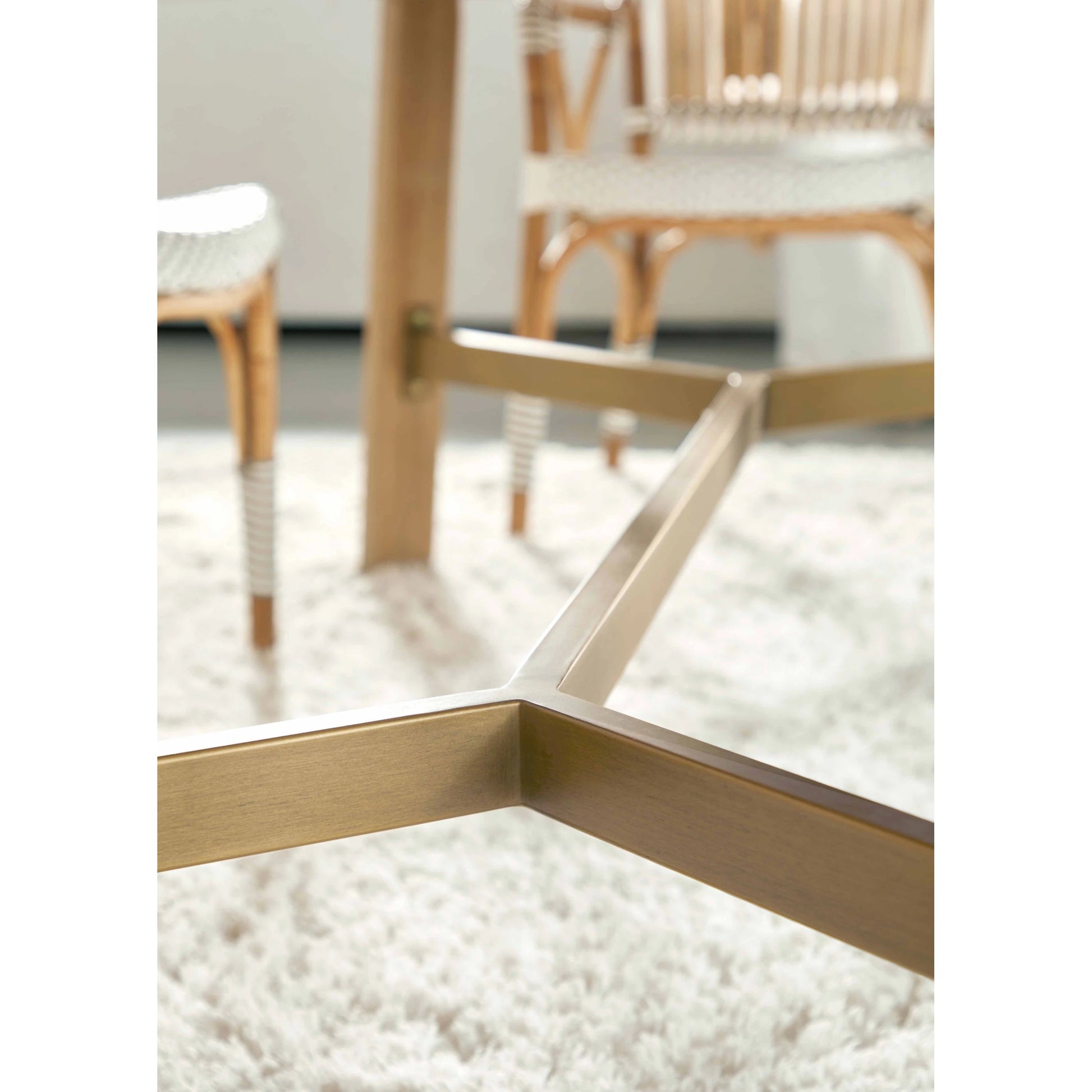 Klein Dining Table by Essentials For Living in light honey oak, brushed gold. Made from oak veneer, mdf, solid rubberwood, metal in a modern style.