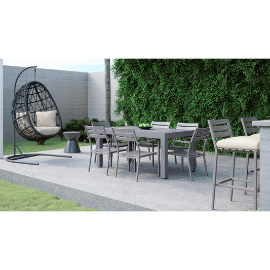 Mesa Outdoor Barstool in Cast Pumice by Sunset West. Made from aluminum in a modern style.