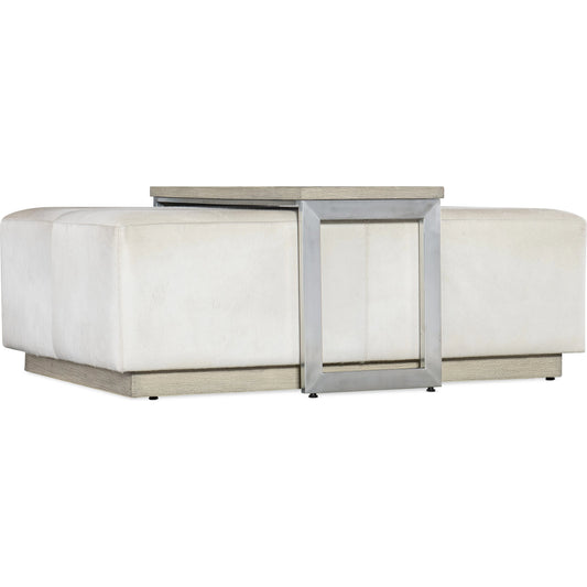 Melange Bridged Cocktail Table by Hooker Furniture in light wood. Made from hair on hide leather with metal, veneer in a modern style.