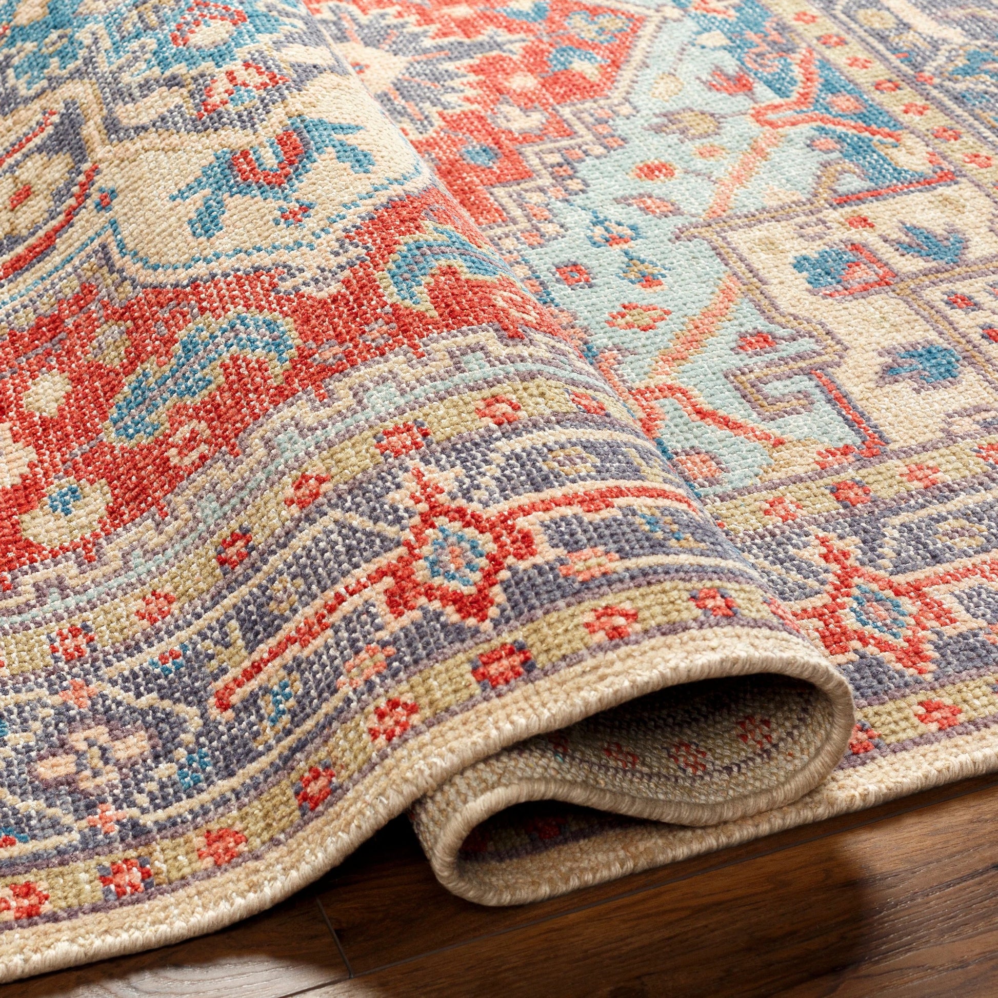 Kars Rug - 30334 by Surya in red, coral, blue, pale blue, tan, light beige. Made from 80% wool, 20% cotton in a unique style.