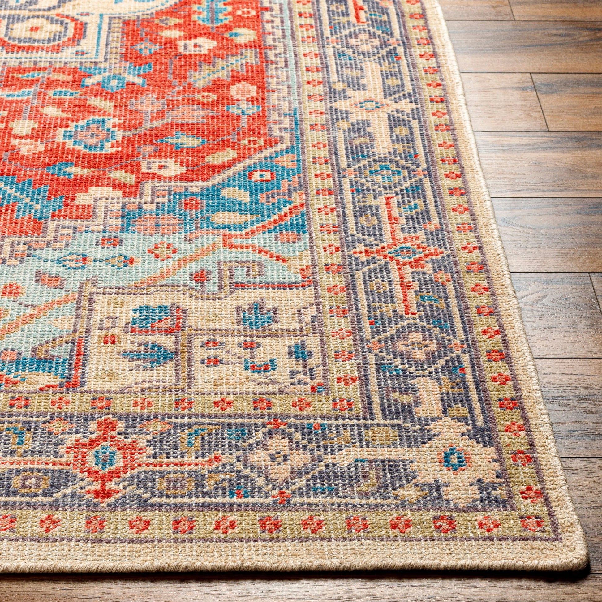 Kars Rug - 30334 by Surya in red, coral, blue, pale blue, tan, light beige. Made from 80% wool, 20% cotton in a unique style.