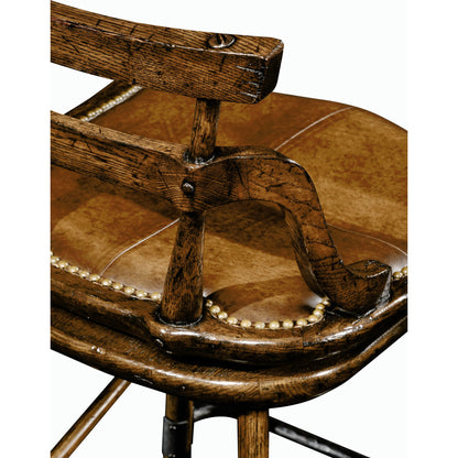 Buckingham Oak Studded Leather Barstool by Jonathan Charles in brown and dark brown tudor oak. Made from oak in a rustic style.