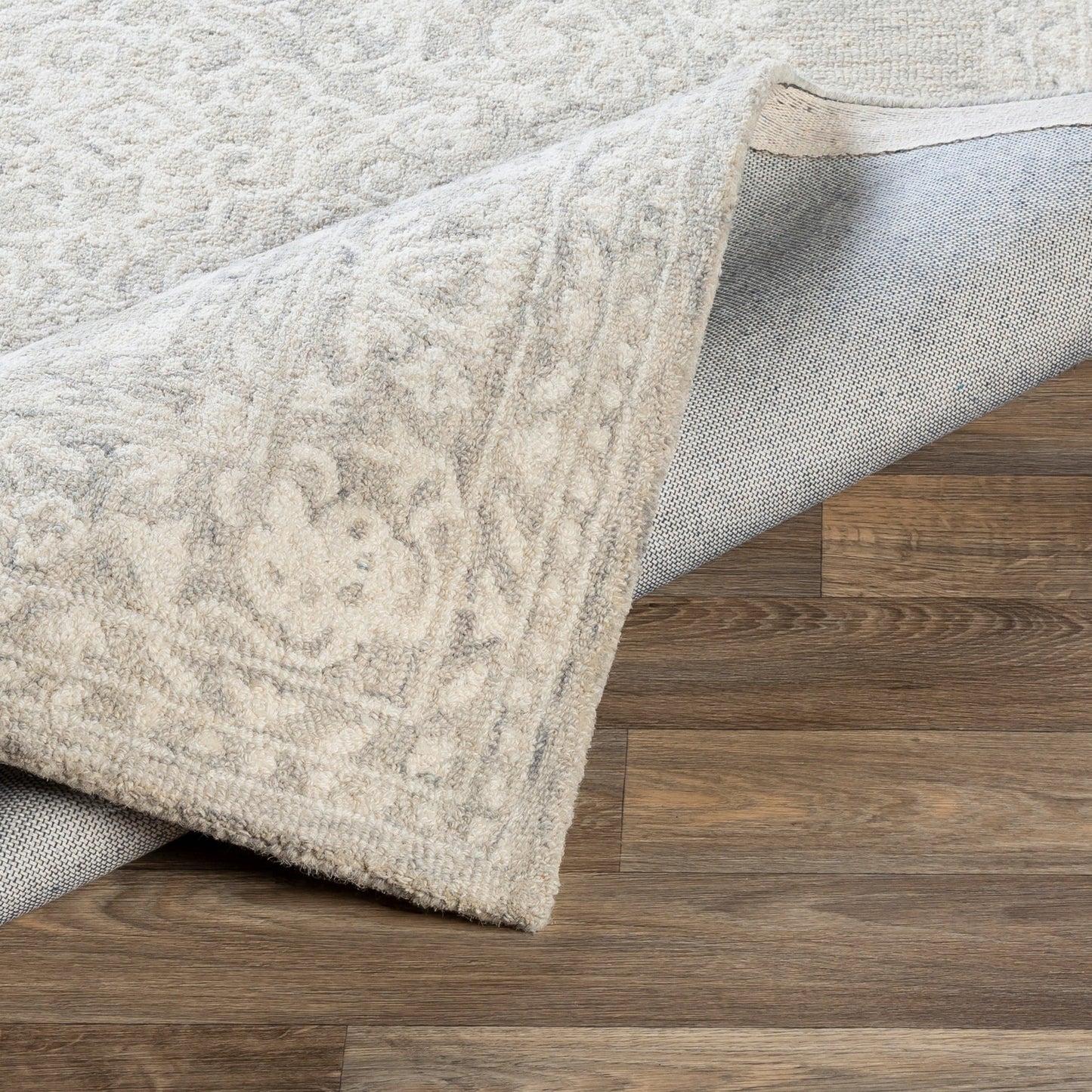 005 SI-1883995,SI-1883996,SI-1883997,SI-1883998,SI-1883999 | Closeup | Kayseri Rug - 24665 by Livabliss in medium gray, light beige, cream. Made from 100% wool in a unique style.