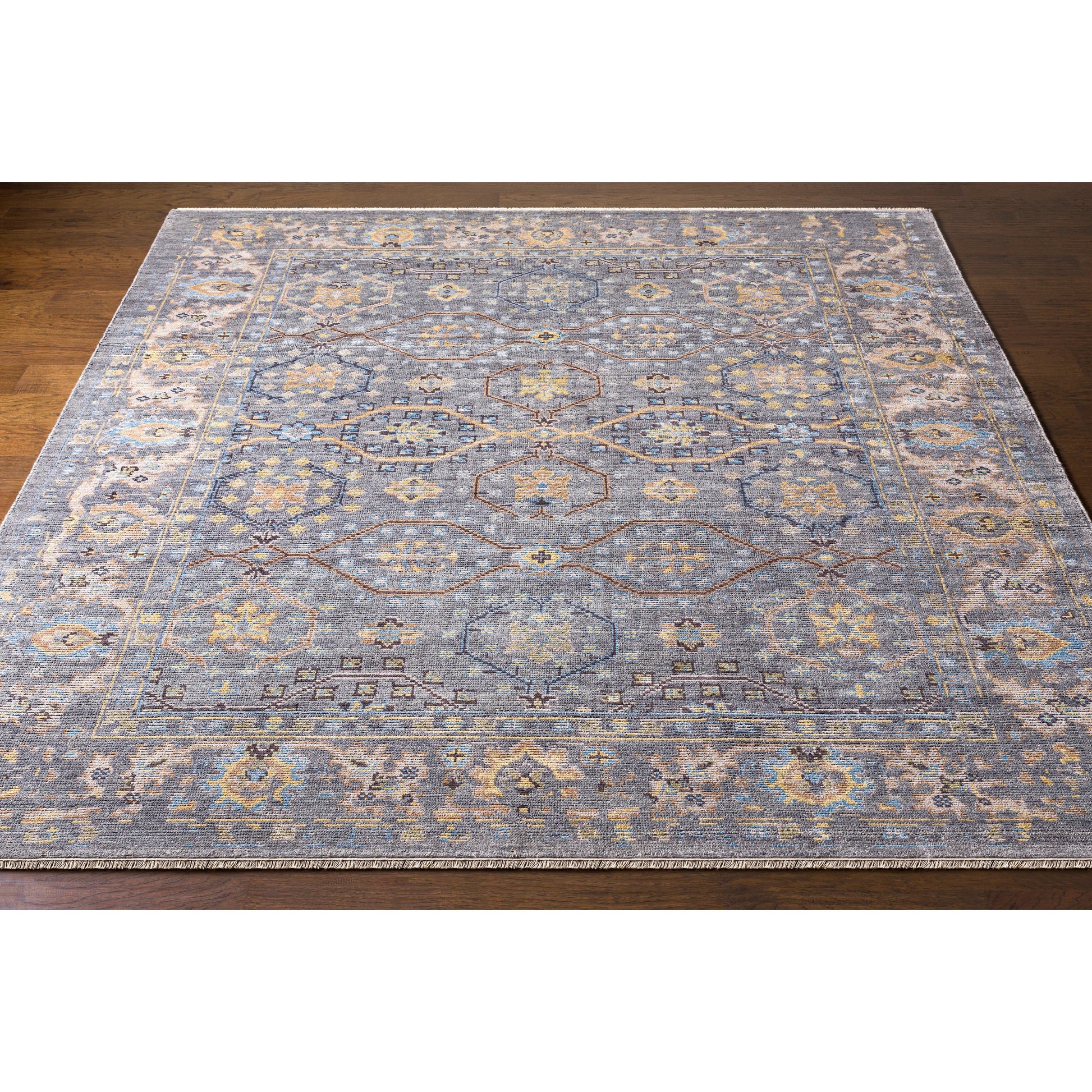 Kushal Rug KUS-2304 by Surya in wheat, pale blue, cream, charcoal, light gray. Made from 70% viscose, 30% wool in a traditional style.