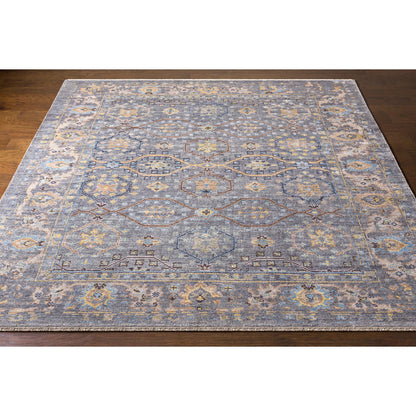 Kushal Rug KUS-2304 by Surya in wheat, pale blue, cream, charcoal, light gray. Made from 70% viscose, 30% wool in a traditional style.