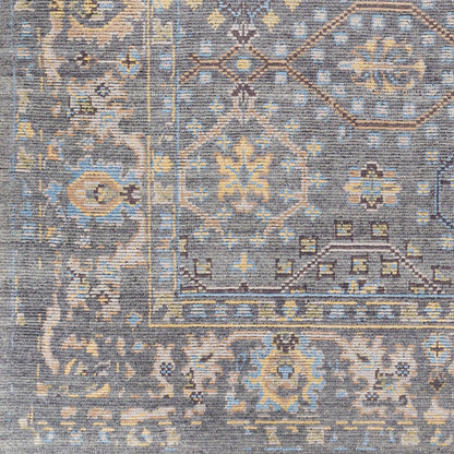 Kushal Rug KUS-2304 by Surya in wheat, pale blue, cream, charcoal, light gray. Made from 70% viscose, 30% wool in a traditional style.