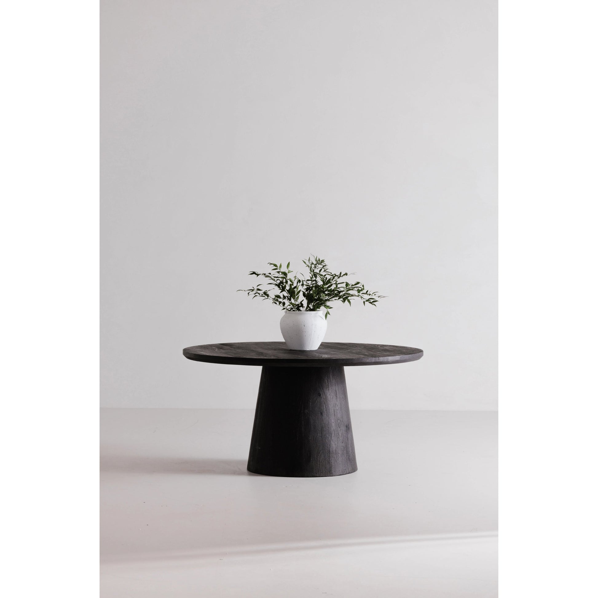 Cember Dining Table by Moe's Home Collection in black. Made from solid mango wood in a modern style.