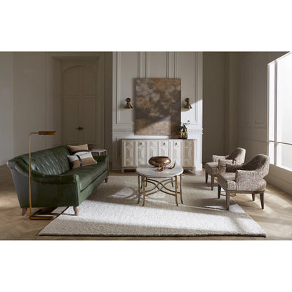 Monier Cocktail Table by Fairfield Chair in antique gold and antique gold. Made from faux, bois metal, calcutta stone in a unique style.