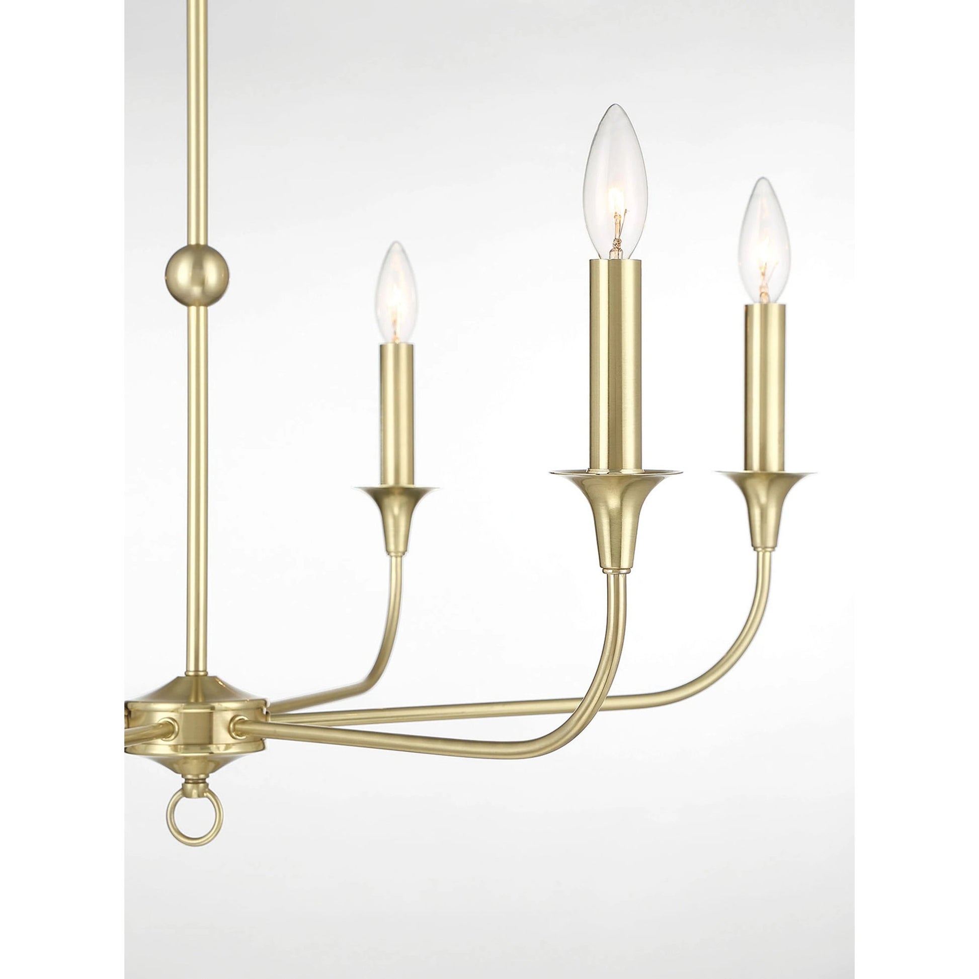 Charlotte Chandelier by Lumanity in classic satin brass. Made from iron in a modern style.