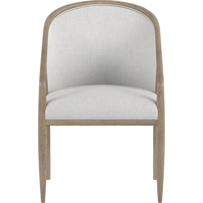 Finn Woven Dining Chair by A.R.T. Furniture in tawny. Made from parawood solids, elm veneer, raffia, foam, fabric in a cottage & farmhouse style.