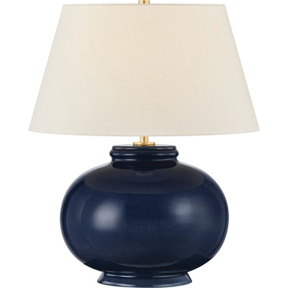 Moodus Table Lamp by Hudson Valley in aged brass, ceramic parrish blue. Made from ceramic in a unique style.