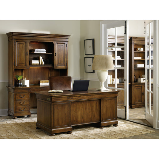 Archivist Executive Desk by Hooker Furniture in pecan. Made from pecky pecan veneers in a traditional style.