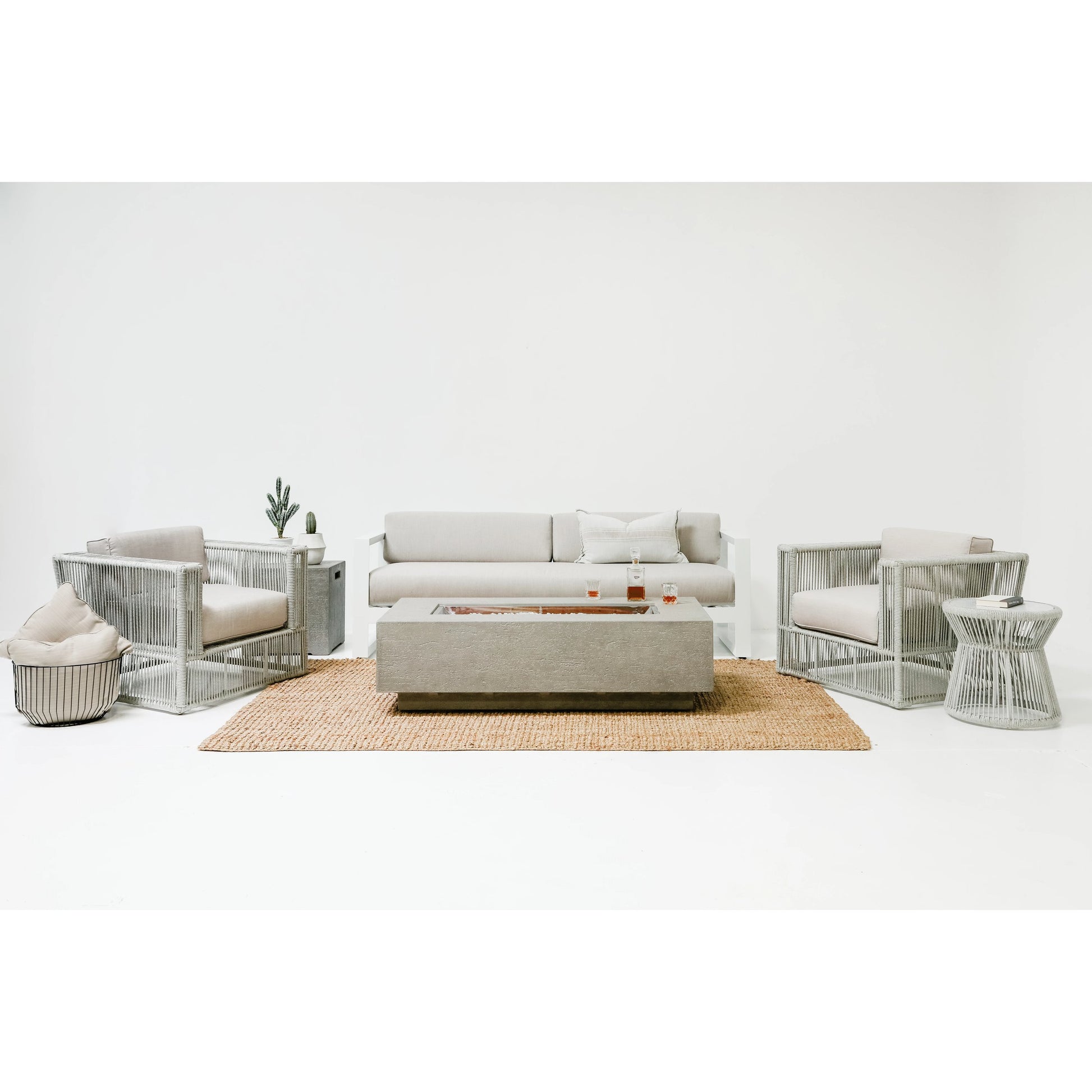 Miami Outdoor End Table by Sunset West in frost. Made from olefin rope in a coastal style.