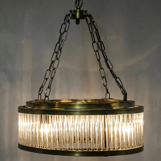 Petronas Chandelier by Noir in antique brass. Made from glass, metal in a transitional style.
