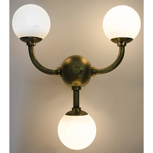 Bari Sconce by Noir in antique brass. Made from metal in a modern style.