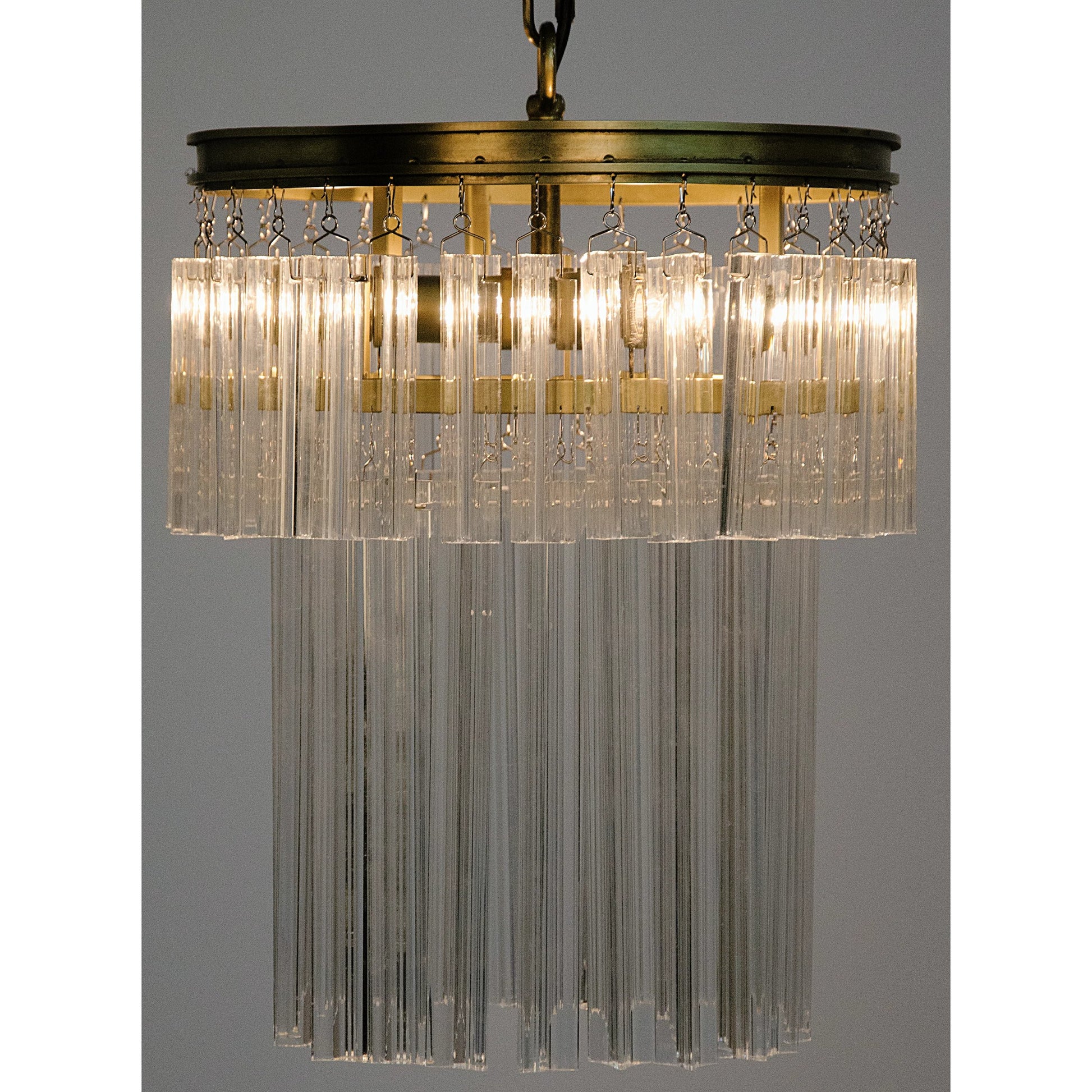Toby Chandelier by Noir in antique brass. Made from metal, crystal in a traditional style.