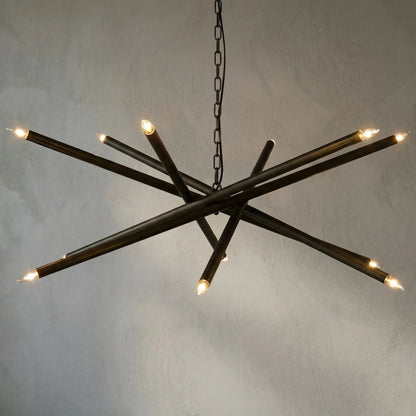 Ikram Chandelier by Noir in antique brass. Made from metal in a modern style.