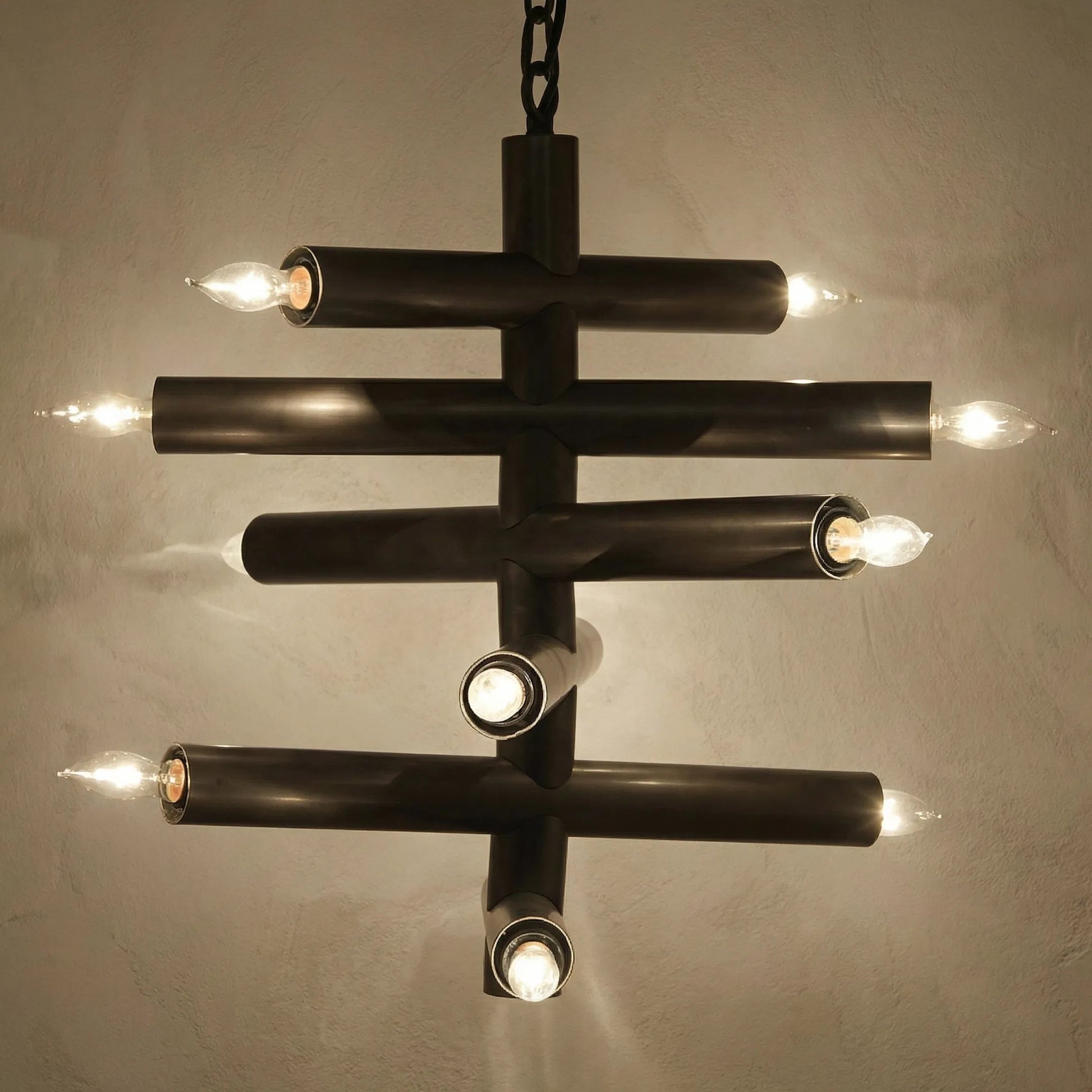 Alex Chandelier by Noir in antique silver. Made from metal in a modern style.