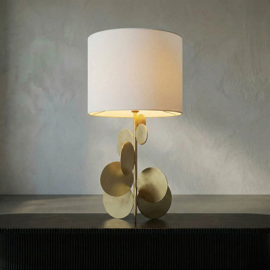 Vadim Table Lamp by Noir in antique brass. Made from metal in a transitional style.