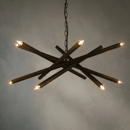 Ikram Chandelier by Noir in antique brass. Made from metal in a modern style.