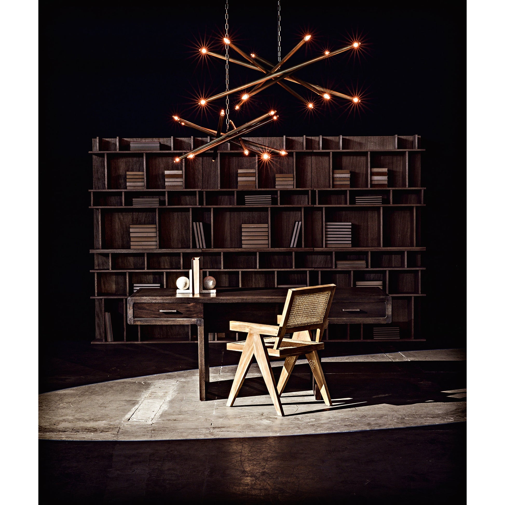 Ikram Chandelier by Noir in antique brass. Made from metal in a modern style.