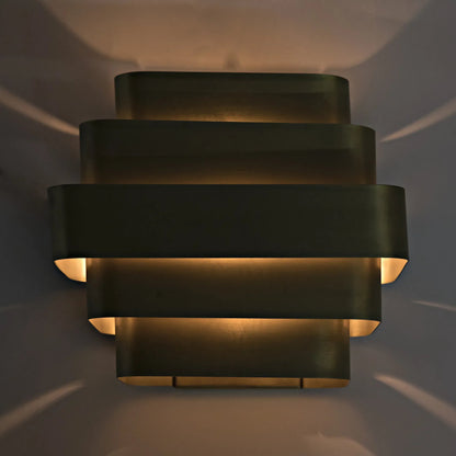 Baas Sconce by Noir in antique brass. Made from metal in a modern style.