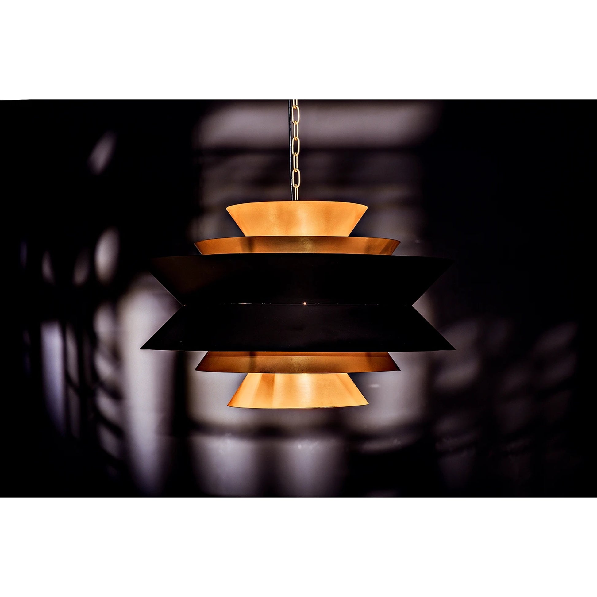 Orion Pendant by Noir in black metal, brass. Made from metal in a modern style.
