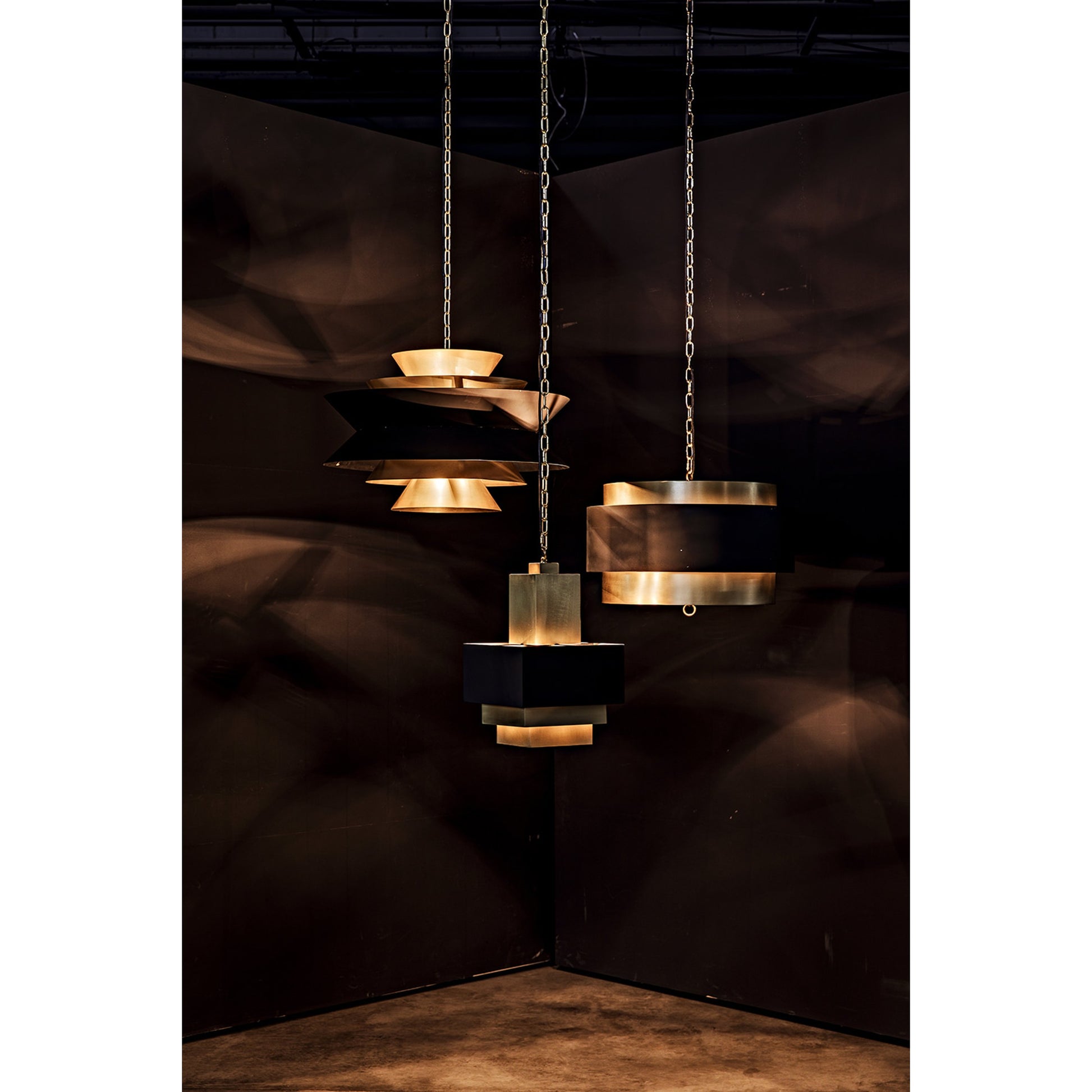 Orion Pendant by Noir in black metal, brass. Made from metal in a modern style.