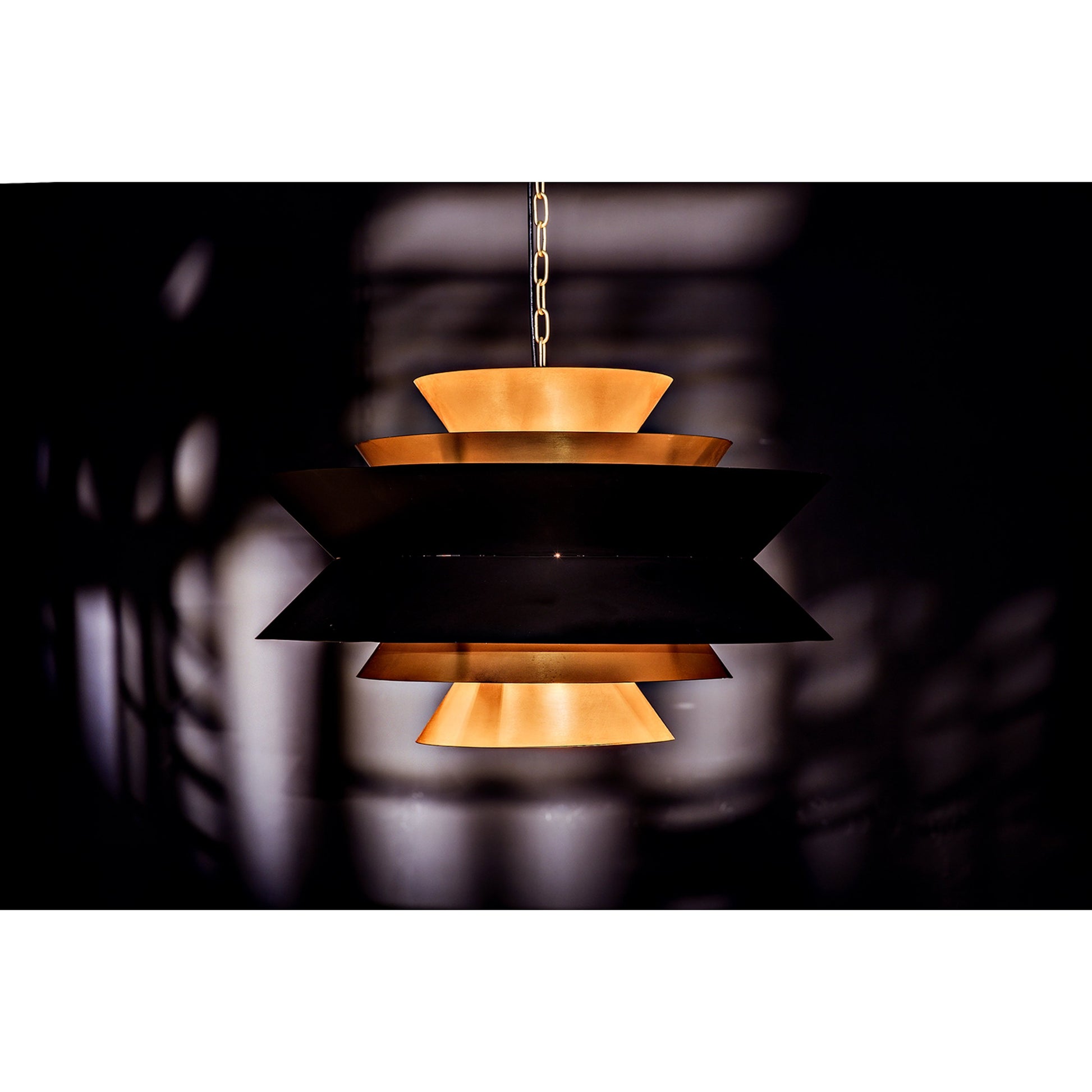Orion Pendant by Noir in black metal, brass. Made from metal in a modern style.